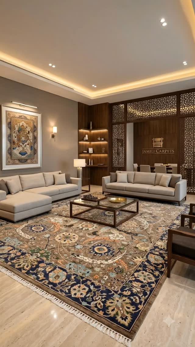 Large patterned blue and brown area rug in a modern grey living room